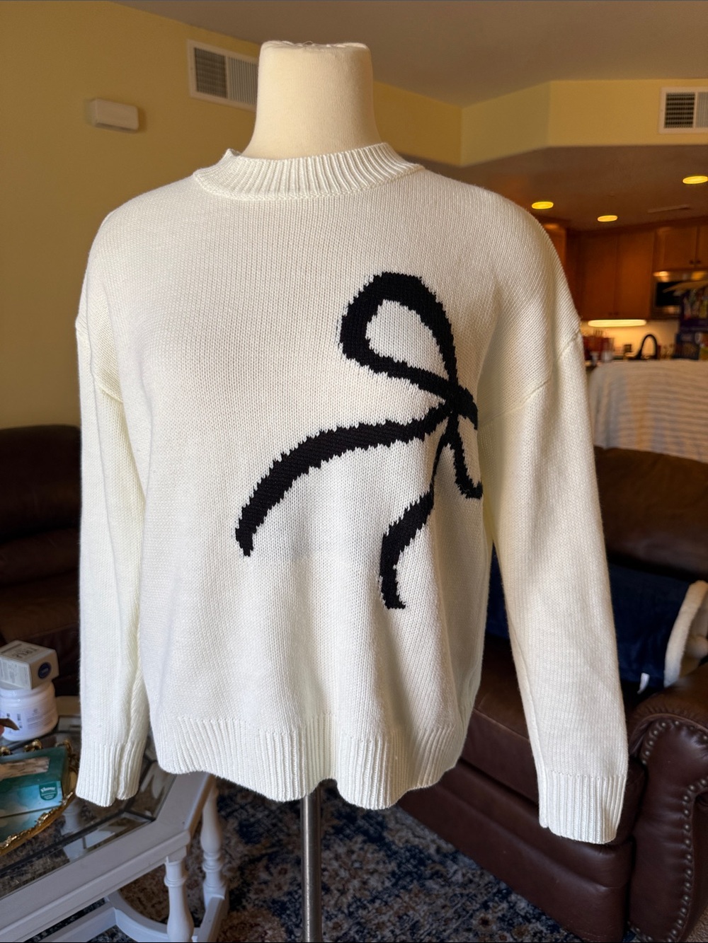 Source Unknown White Crewneck Sweater with Black Bow Graphic